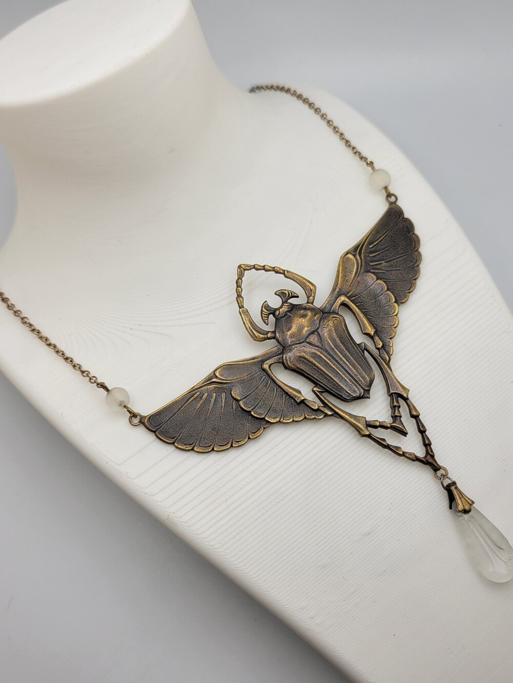 Antique Brass Scarab Wing Necklace with Clear Sculptured Teardrop Pendant